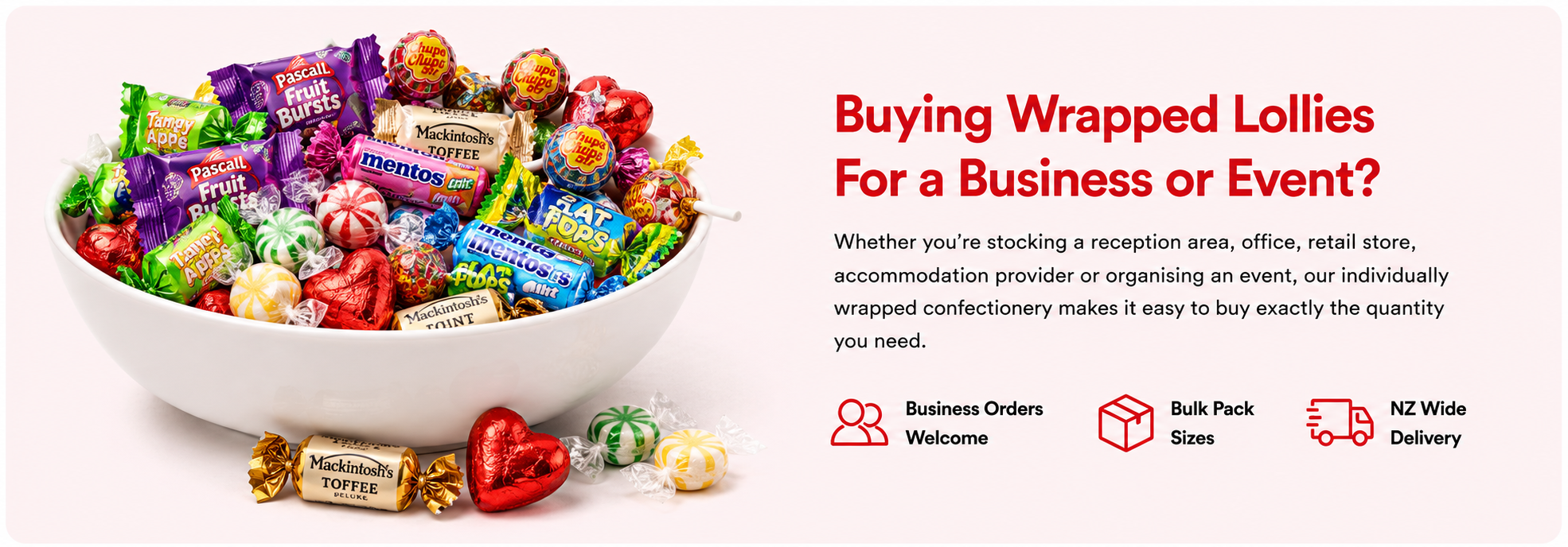 A promotional banner showing a white bowl filled with assorted wrapped lollipops and candies on a light pink background. Large red text reads 'Buying Wrapped Lollies For a Business or Event?' with smaller descriptive copy and icons for Business Orders, Bulk Pack Sizes, and NZ Wide Delivery.