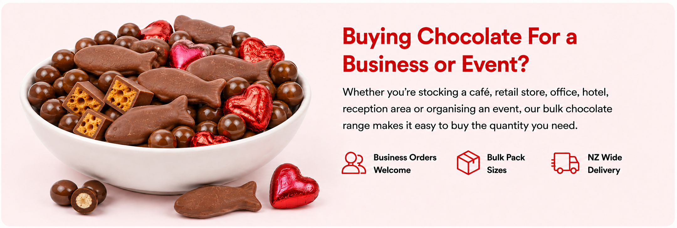 A promotional banner for bulk chocolate ordering, featuring a white bowl filled with assorted chocolates and heart-shaped candies on a pale pink background. Text on the right reads 'Buying Chocolate For a Business or Event?' with supporting details about bulk pack sizes and delivery.