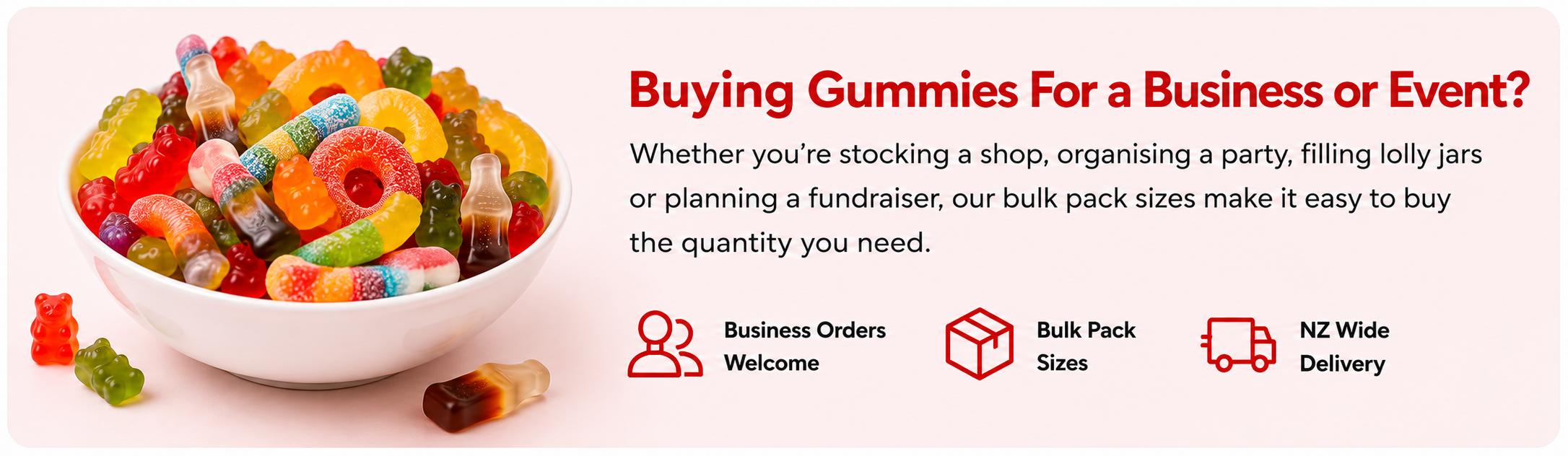 A promotional banner for bulk candy gummy packs. On the left, a white bowl is filled with assorted colorful gummy bears, rings, and soft candies.
