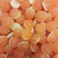 Delicious peach shaped gummy candies with a soft white cream foam backing lightly coated in sugar.