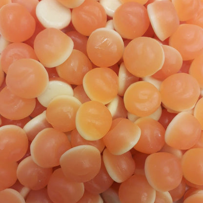 Delicious peach shaped gummy candies with a soft white cream foam backing lightly coated in sugar.