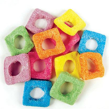A colorful mix of Rainbow Sour Squares with vibrant, square-shaped aerated gummy lollies coated in a fine dusting of sour powder.