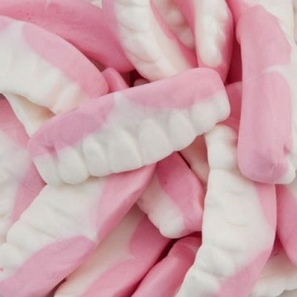 Rainbow Teeth 1kg milk flavoured teeth shaped gummy lollies in a bulk
