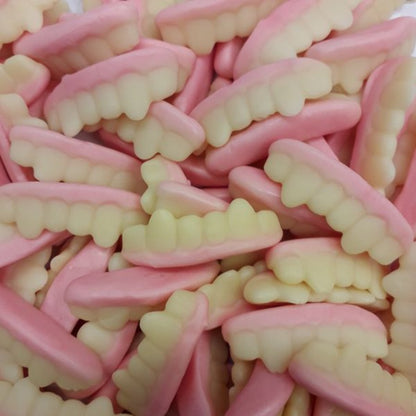 Rainbow Teeth milk flavoured teeth shaped gummy lollies in a bulk bag