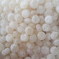 Bulk bag of traditional yellow acid drops hard boiled confectionery lollies