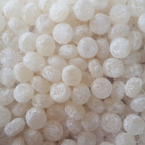 Bulk bag of traditional yellow acid drops hard boiled confectionery lollies